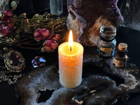 Infusing Candle Magic Spells with Herbs and Essential Oils
